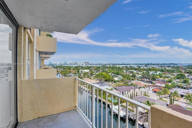 balcony featuring a water view