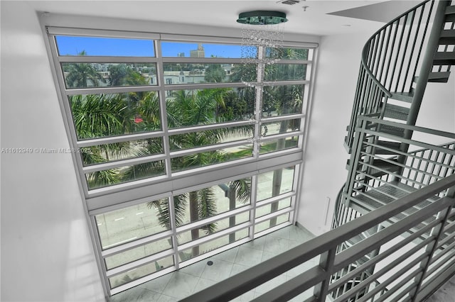 421 Meridian Ave Unit 16, Miami Beach, FL 33139 - staircase with a chandelier