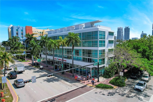 421 Meridian Ave Unit 16, Miami Beach, FL 33139 - view of property with uncovered parking and a city view