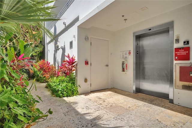 421 Meridian Ave Unit 16, Miami Beach, FL 33139 - entrance to property with elevator and stucco siding