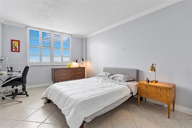 bedroom featuring a textured ceiling, light tile patterned floors, and crown molding