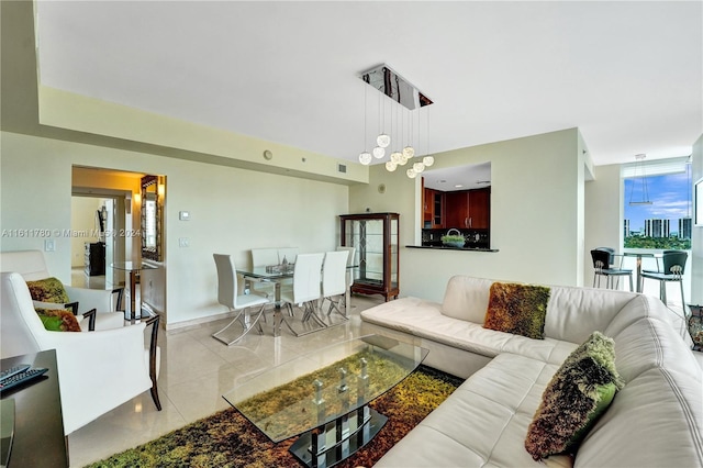 living room with light tile patterned floors