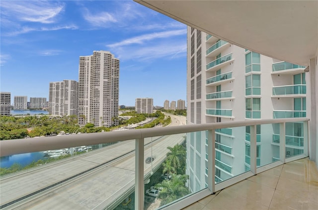 balcony featuring a water view