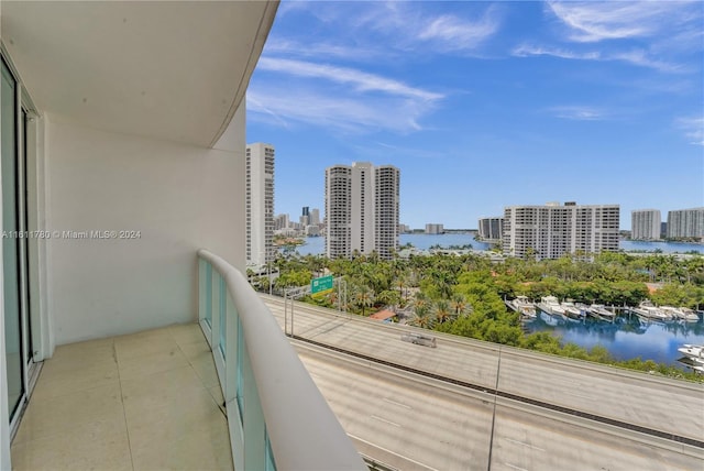 balcony featuring a water view