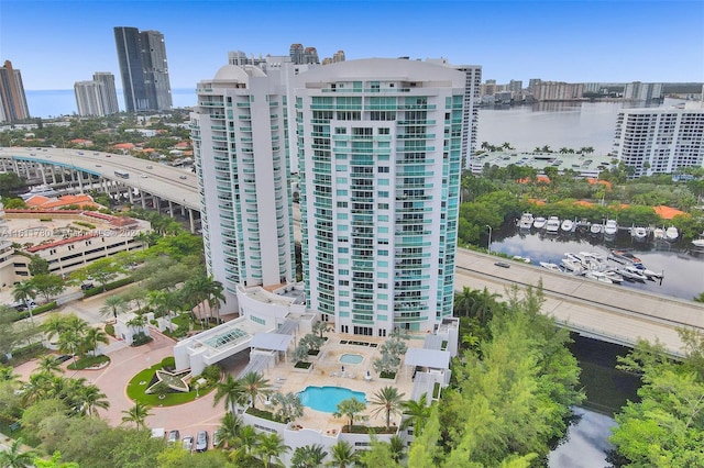 view of building exterior with a water view