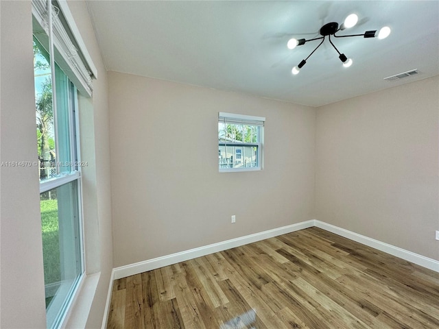 empty room with light wood-type flooring