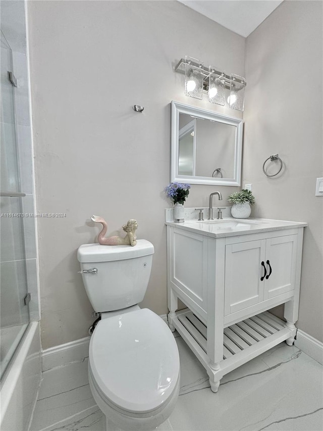 full bathroom with shower / bath combination with glass door, vanity, and toilet