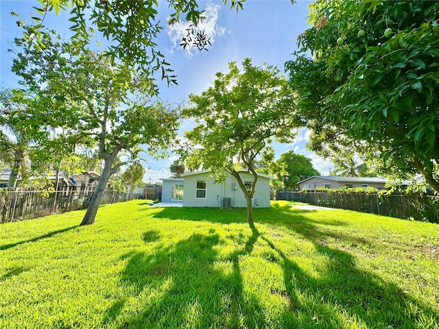 view of yard featuring central AC unit