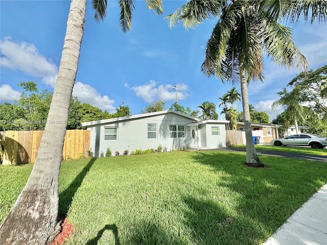 view of front of home with a front lawn