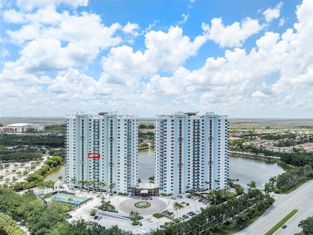 birds eye view of property featuring a water view