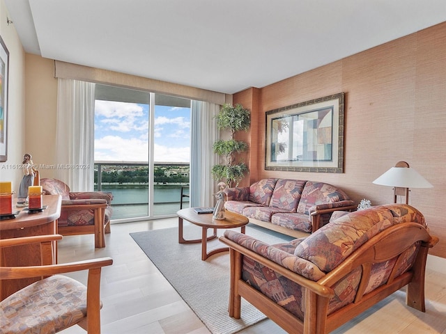 living room featuring a water view