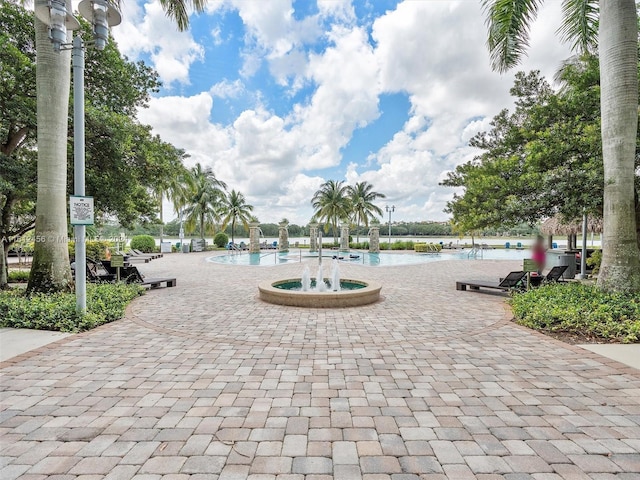 view of pool featuring a water view