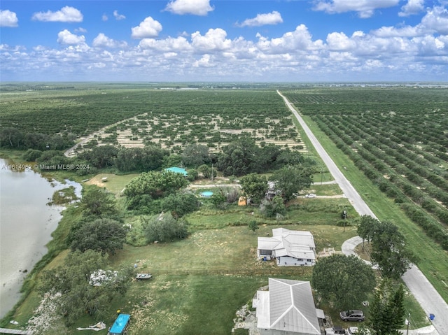 aerial view with a water view and a rural view