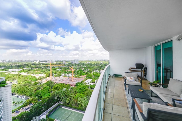 2101 Brickell Ave Unit 2009, Miami, FL 33129 - balcony featuring an outdoor hangout area and a city view