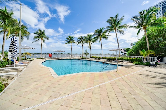 view of swimming pool featuring a patio area