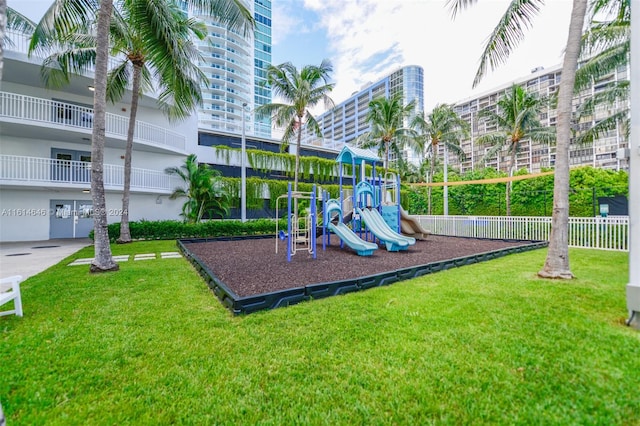 view of play area with a yard