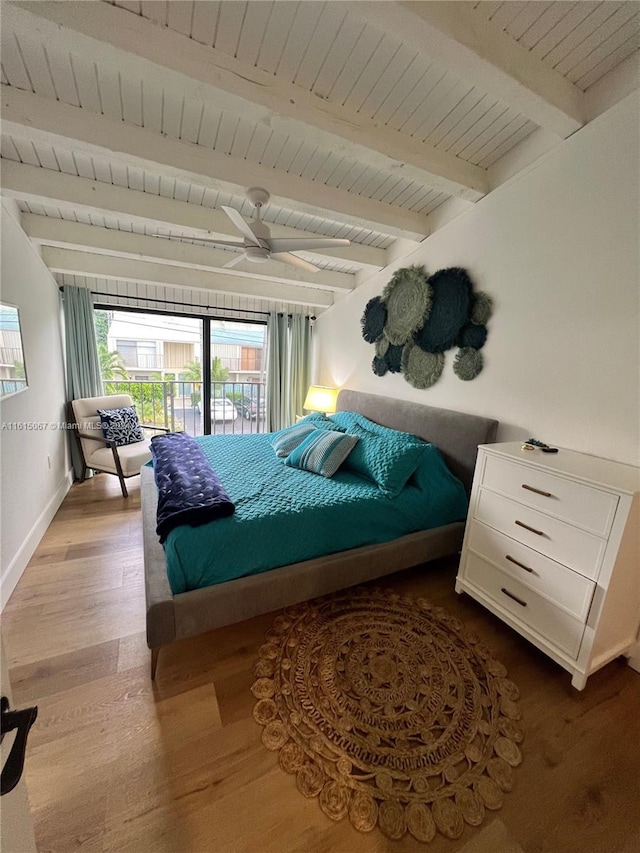 bedroom with hardwood / wood-style flooring