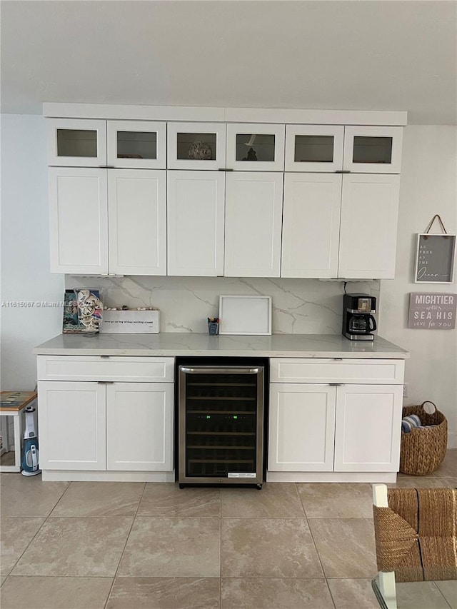 tiled dining space with beverage cooler