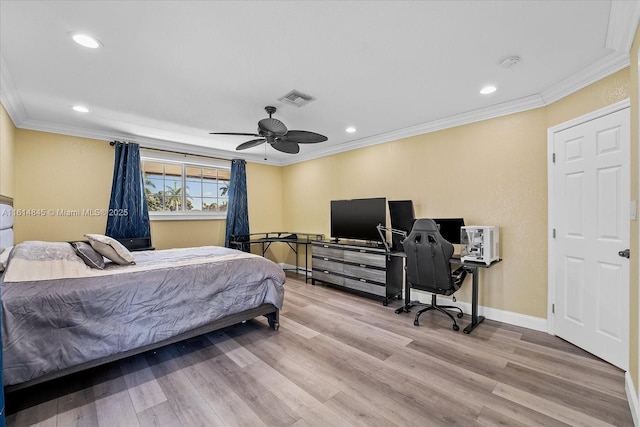 bedroom with ceiling fan, light hardwood / wood-style floors, and crown molding