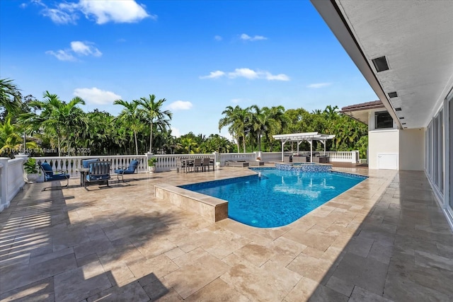 view of swimming pool featuring a pergola, a patio, and an in ground hot tub