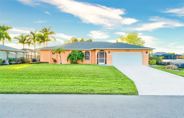 ranch-style house featuring a front lawn and a garage