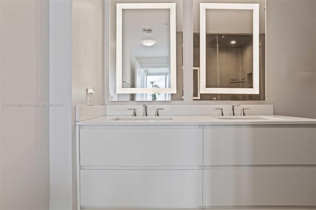 bathroom featuring vanity and walk in shower