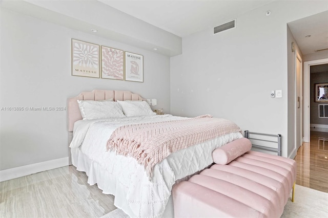 bedroom featuring light hardwood / wood-style floors