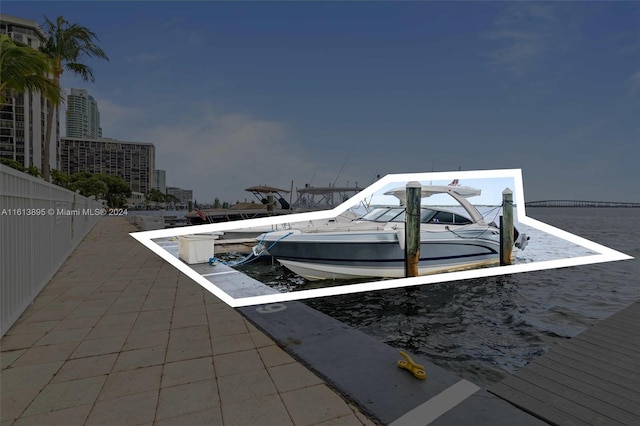 exterior space with a boat dock and a water view