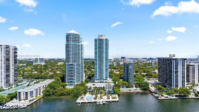 birds eye view of property featuring a water view