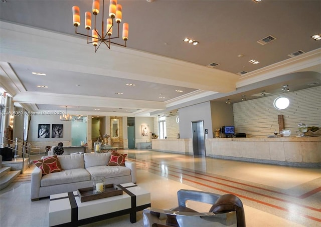 interior space featuring an inviting chandelier, elevator, a tray ceiling, and crown molding