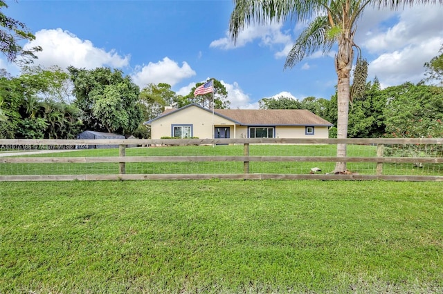 view of front of home featuring a front lawn