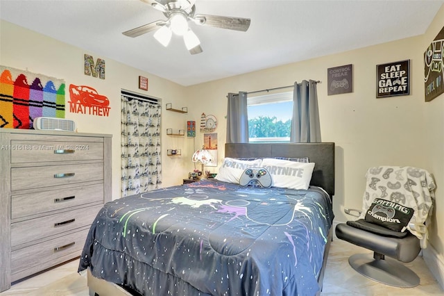 bedroom featuring ceiling fan