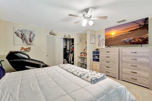 bedroom featuring a closet and ceiling fan