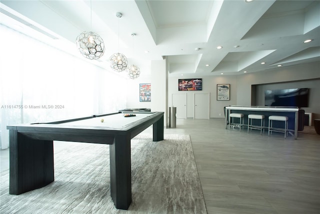 recreation room featuring billiards and a tray ceiling