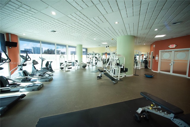 workout area featuring expansive windows