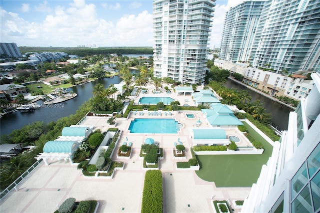 birds eye view of property with a water view