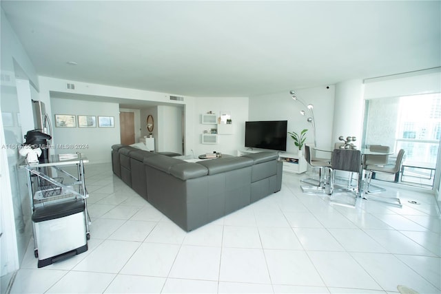 living room featuring light tile patterned floors