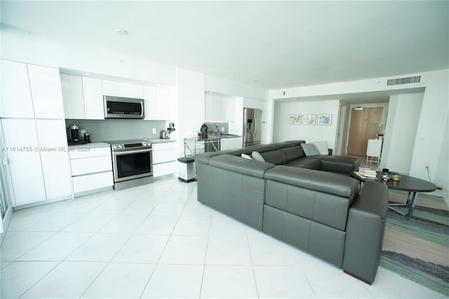 living room with light tile patterned floors