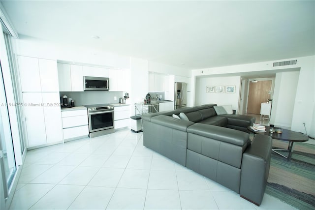 tiled living room with sink