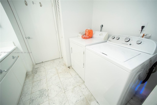 laundry room featuring independent washer and dryer