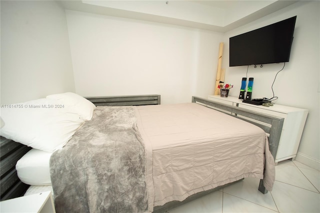 bedroom featuring light tile patterned floors