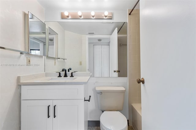 full bathroom with vanity, toilet, and tub / shower combination