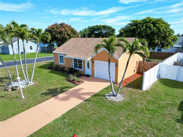 view of home's exterior with a garage and a lawn