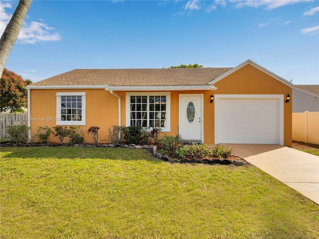 single story home featuring a garage and a front lawn