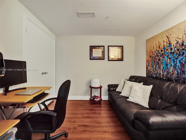 office area with dark wood-type flooring