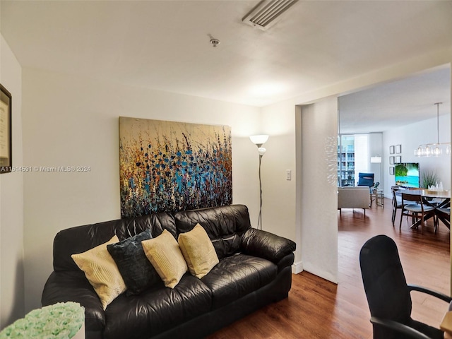 living room featuring dark hardwood / wood-style floors