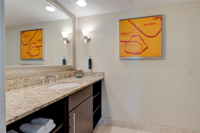 bathroom with vanity and tile patterned flooring