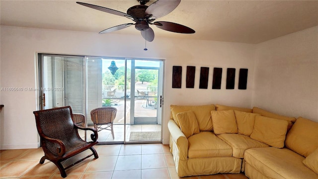 living room with ceiling fan and light tile floors