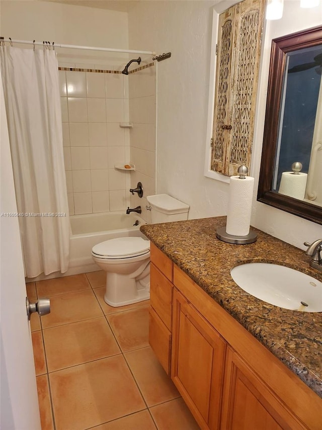 full bathroom with tile flooring, shower / bath combination with curtain, toilet, and vanity