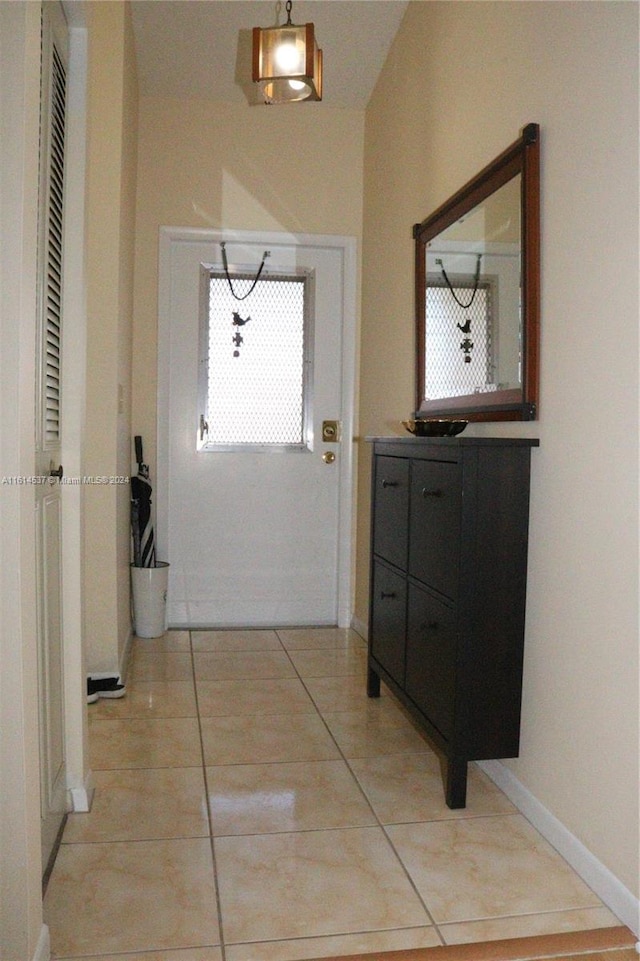 interior space with light tile patterned floors